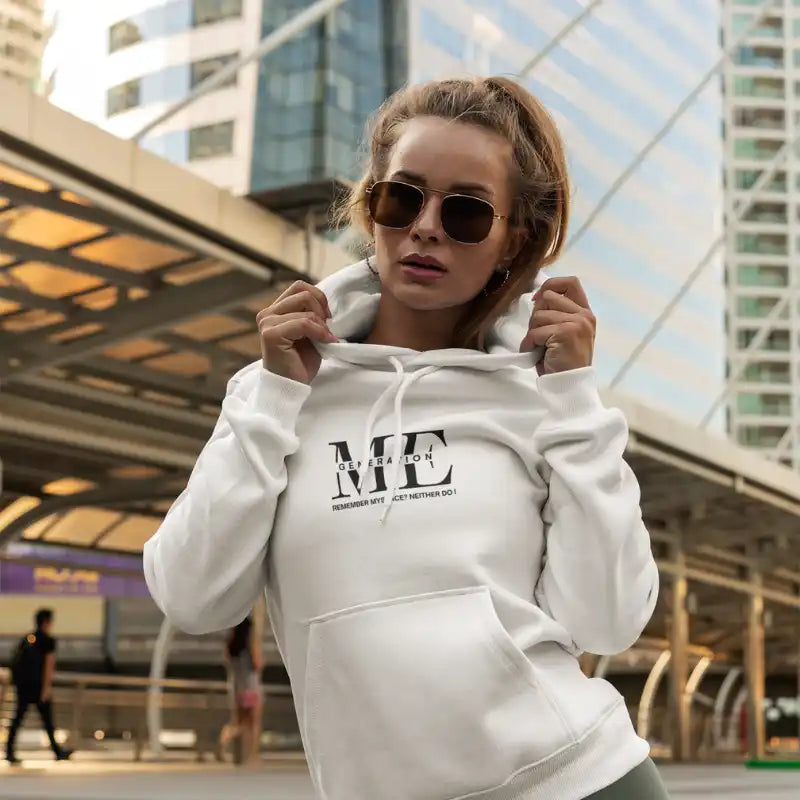 White hoodie sweatshirt with ’ME’ text printed on the front.